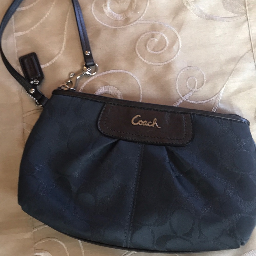 Coach Wristlet in beautiful blue toned Silver
